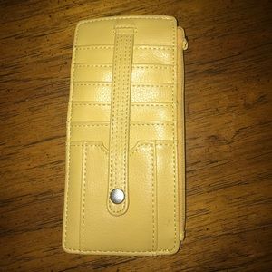Cute flat wallet in mustard yellow.